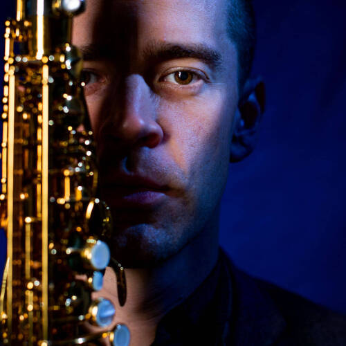 dan graser holding saxophone